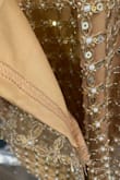 This dress uses the cheapest fabric; the mesh is scratchy and more than half of the pearls and beads arrived missing. The hem of the dress is just cut off. - Rebecca S.