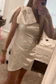 I love this dress. The quality is nice, but there were a few loose threads. I sent it back and got another one and it's fine. I normally wear 26/27 in jeans & XS in tops. I sized up to an M because I was afraid Lulus was junior sizing. I'm glad I did. It's slightly big, but because of the ruching you can't tell. The S probably wouldn't zip. I purchased this to wear for my engagement photos. I'm so excited! - Cassidy G.