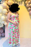 Got this dress as my baby shower dress and it was perfect!! Due to my 8 month baby bump, I did have to tailor the slit in the front to close it a bit since it was showing too much, but other than that, it fit perfect and was super comfortable! - Michelle S.
