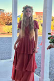This dress was lovely for my daughter to wear to her brother's wedding. We were very pleased with the quality, fit, customer service, shipping, etc. 
Thank you, Lulus! - Abbie W.
