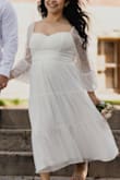 Wore this dress for our elopement at 23 weeks (almost 6 months) pregnant! It was perfect as it was flowy enough to not constrict my bump. With the bump, the medium size was great. - Lesly R.
