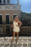 I was a bridesmaid and we all wore white. I am in between sizes so I did get this altered. I just got the strap taken in and a little bit on the side. I absolutely love the stress. It flattered my curves well. I am unsure of my actual hip and waist measurement. - Christine