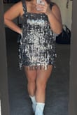 This dress fits great; however, the bottom fringe is a little tight around the hips while the others fit just right so if you have a bigger butt you might want to size up for comfort. Didn't have to alter the straps as a short person with a short torso for once. - Suzie C.