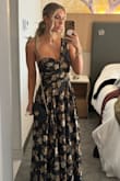 Got so many compliments on this dress all night long. Felt supported with just one strap; didn't have to wear a strapless bra, and it was so comfortable and flattering! I did get it hemmed about 2 inches to wear with 3-inch heels - Casey L.