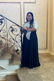 The dress was beautiful; the material was nice and soft. Only complaint, a little long since I got an XL and I'm 5'3. - Karen O.