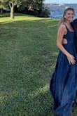 I wore this to a wedding and really liked it! The back elastic was a little tight on me, but it wasn't too bad. The bow detail is super pretty! It was the perfect length for me to wear with sandals (not heels), but I am very tall, so I'd imagine that it'd be perfect for other people to wear with heels. - Charlotte R.