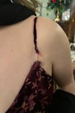 I wore this to a fall wedding. I got so many compliments. It fit my body beautifully, and it was very comfortable! However, the straps did not last long. I barely danced and one snapped (thank goodness for safety pins) and the other was close to snapping by the end. Also, my friend had to tell me at the wedding that one of the back ruffle panels didn't come down long enough and you could see the fabric underneath. Very frustrating! - Katie G.