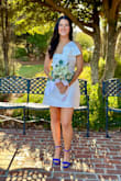 I absolutely loved this dress! I got so many compliments on it. Was super comfy and never gave me any trouble. Looked great in pictures and was easy to move in! - Landry B.