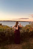 This dress was absolutely perfect and fit so nicely. Loved the details in the back. The dress also didn't need any altering, which was a huge plus. - Lizzie G.