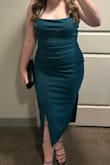 I got this dress last minute after not being sure about my original dress for a friend's wedding. It was PERFECT. Moved with me, stretchy, and I was able to dance. I did have to have the halter neck altered, but that was an easy, quick, and cheap change. Beyond pleased and I got so many compliments! - Rachael N.