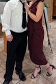 This dress was super cute for a fall wedding I attended. I'm 5'3" and didn't think the length was too long. I have a short torso, though, so I wish the strap was shorter and more supportive, which would have prevented the cutout from sagging in a weird way. I used fashion tape when I first put the dress on to keep the cutout in place, but if the strap was shorter, everything would have laid nicer. The overall fit was probably true to size! - Shelby A.