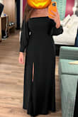 I LOVED wearing this dress. It was fitted at the top, but the waistline hit right above my waist so I didn't feel like I had to suck it in all night. I wore it ON my shoulders for a flattering square neckline. If I were to get picky, I'd say I wish the sleeves went all the way down to the wrists, but I was good with their slightly shortened length. It was flowy, and the slit was just right. I got a lot of compliments and I can't wait to find an excuse to wear it again. - Alyssa W.