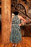 I'm glad I read the reviews that this dress runs large. I ordered a small when I usually a medium or large. It fits perfect. I'm excited to wear it to Costa Rica! - Brooke S.
