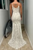This was the dress I thought for sure was it. And could be, maybe, if I size up to a medium. But the medium is sold out so I'm sol atm. It's beautiful and simple, and I think the slight train and back is stunning.
No stretch, so if you're between sizes, I would recommend sizing up - Hannah R.