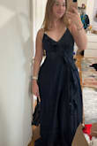 This dress is a gorgeous color and I'm a big fan. It fits my chest; the straps are adjustable by virtue of being a lace up style in the back, and the material is comfy. The only issue is that it's wayyy too long for me and I'll need to get it altered to fit my height. I'm also short at 5'3 so I'm used to that by now. - Jackie M.