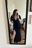 I feel incredible in this dress, it fits beautifully (definitely long but I'm used to that with my height). I wore shape wear under for my own comfort but it doesn't fall weirdly at all. I can't wait to wear it for the wedding! - Kat B.