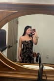 Absolutely love this dress and got a lot of compliments. The top was snug and didn't need to be adjusted. The slit in the dress rides up when you're sitting down. I was glad I brought a cardigan and could cover myself while sitting. Otherwise, no complaints and a beautiful dress! - Nicole M.
