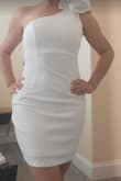 I want to change dresses for my wedding as my ceremony dress would not be comfortable to dance. I got 6 dresses and ironically, this one on sale and unable to return was the winner. It looks elegant and sexy at the same time. The one thing is that in the chest area has a layer that goes only until the start of your rib cage, but that makes it look weird. I wish the layer was in the entire dress. - Julieth C.