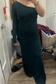 It looked good once it was on, but it was very difficult to zip up and position correctly. I had spent quite an amount of time combing through reviews to get the right size, but still ended up pretty small. I'd wear it if it weren't for the material; I was sweating within seconds. I understand polyester traps heat but this dress was a different story. Wouldn't be able to dance at a wedding reception in this. I'd probably have a heat stroke. Don't get me wrong, it still looked okay and would maybe keep you warm if the wedding was outside in the winter. - Leigh F.
