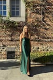 Stunning wedding guest dress in a fabulous green colour. It fit the colour palette of the autumn wedding perfectly! 

The length was slightly too long for me but worked with high heels. And it's not uncommon for me to get dresses altered (shortened) with my 5' 4". I did have to add a button so the slit wouldn't be too high and I could dance all night without being worried. - Linn V.