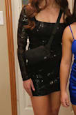 Great dress. Only issue was looks like it was previously worn/ tried on and the zipper was broke.  We didn't have time to send back so got the pliers out and made it work. Looks great and for was true to size. - Miranda E.