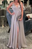 This dress is absolutely stunning! In the picture it looks "meeh" but when I tried it on I felt like a princess. Super comfortable and elegant. It runs very large if you're not that tall but I didn't care. Great deal and super elegant fabric. It looks silver but it also can have "lilac tones" with certain light. Loved it! - Laura J.