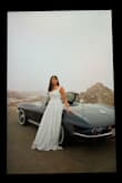 Used it for a photoshoot and I love the sleeve straps that can be placed up or down. The corset is nice; it did have some bunching but still looked good. - Eveleen P.