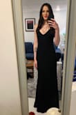 I bought this dress for my brother's wedding and it's perfect! In the pic, I'm wearing 3'' heels, and the dress was still long enough. At first, I exchanged this dress for an XS because it felt a little big in the waist, but the XS was about 3-4'' shorter and clung to my body like a glove. Some like that look but it was a little too snug for me. I exchanged it again for the small one and love it! It fits perfectly and somehow fits my waist better than the first. - Krystle G.