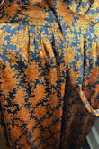 The design of the dress is actually pretty, but only in the presentation photo. When I received it, the color was too gaudy and heavy & it looked like a pumpkin costume!!! - Dina I.