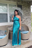 This dress is so beautiful. It's not a color I would normally go for but I wore it for my senior prom and I felt so confident in it and it was unique. then about a year and a half later my friend borrowed it for our college dance and she loved it too! we kind of have different body types but it worked for both of us! it fits nicely - not too tight but also shows off your figure in a flattering way. gets a lot of compliments - highly recommend. - Ashlyn W.