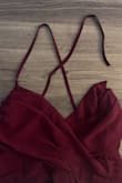 This dress is so pretty, the color is dark and rich and it fit perfectly well. I ordered this to wear at my little brother's wedding. It held up all day; through running around, taking pictures, dinner, etc. But as the reception went on, I felt a snap and realized the strap just... gave out? Thankfully I had a safety pin and my husband was able to safety pin the strap together, but I was so disappointed by the quality. For nearly $100, I expect the straps to hold up for more than just wear and one evening. This is the second formal dress I've ordered from Lulu's that had an issue with quality. :( - Kelsey D.