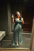 This was a reasonably priced dress. I got a lot of compliments on it at the wedding I wore it to.
I will say that the dress snagged easily on my ring so definitely be careful there, and the zipper had a hard time going up over the hem, even when I wasn't wearing it.
If you're short, this is going to be super long on you. Even in 4 inch heels, I had to hold on to it to not step on it. I liked it overall but I'll definitely get it tailored before trying to wear it out again. - Cynthia G.