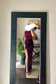 Okay, first of all, gorgeous dress! The material is not stretchy. But I still listened to the reviews here about sizing down and it fits perfectly! I am normally a size Small and got the XS for this dress. My Stats are: 32 - 28 - 27 (roughly). I am 32B in bra size. And I am 5'3 in height. With my 3 inch heels, I figured I don't need hemming. No alterations done. - Eirille O.