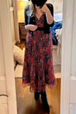 Fits true to size, I have a small bust and it's very low cut and the cups were a little loose. Wore inserts to fill them out :) Colors are beautiful and the cut is flattering. Definitely recommend :) - Stephanie H.