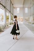 This is a beautiful well-made dress. I bought it for my daughter for a preference ball. She said that it was very comfortable and it fits perfectly. - Stacy A.
