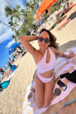 I love the way this suit fits. Its unique one-shoulder design is great, though the top strap may sometimes need adjusting. Super flattering, I sized up as I typically do for swimsuits. I'm 5'4, 135 lbs, 28 inch waist. - Angela L.