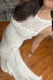 I bought this on a whim because it was so affordable, I figured it could be my rehearsal dinner dress and boy am I glad I bought it. It's so bohemian and comfy, just sliiiightly tight in the hips/butt area but still fits right. The train is really long so I think I might shorten it but otherwise, I really do love this dress, especially at this price point! I've got slightly broad shoulders and a large bust and the medium still fit me well! - Mackenzie R.