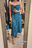 This is a very pretty and also elegant dress. I chose a different dress to wear on the formal wedding I attended but I will keep this one because i can wear it to church or more formal events, it can be very flexible. The only thing I wish it had is a built-in bra like the other dress I chose. It's a little loose on my waist but I prefer it that way, not tight fitting and it's comfortable. My husband loves it, he says it makes me look taller. - Micah O.
