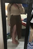 I wanted to love the skirt so badly! I ordered an extra large because I have 44-48" hips, but even with an XL I wouldn't be able to sit down in the skirt with how high the slit is. I truthfully couldn't button the second button and have it sit properly on my body. Wish they made just one size bigger! This would've been so cute for fall! Had to return. - Hannah A.