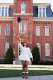 The dress runs a little large but it was perfect with my cap and gown! - Ariana B.