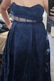 Terrible dress. Super thin. No structure in the top at all. Boning is flimsy plastic that bowed out. 0/10 - Emily D.
