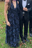 Ordered this for a black tie wedding and it was great, the material is nice and the tiers give a nice shape to the bottom. The V was a little too deep- I have a short torso and didn't have fashion tape. I ended up using a safety pin to keep the girls from slipping out. - Jessica J.