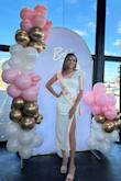 Love, love, loveee this dress! I wore it for my bridal shower and received so many compliments! It's elegant but comfortable, and I felt so 'bridal' throughout the event. I'm usually a small, but ordered an XS because I didn't want to risk it being too big without time for returns. I had a little difficulty zipping the dress up, so I would say it's true to size, as a small would have probably fit me with ease. - Anna B.