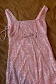 For the price of this dress, it feels like it's from SHEIN. The quality is horrible. The fabric is thin and the fur at the bottom isn't even attached all the way around. Immediate return - Alexis G.