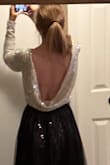 I loved this bodysuit. I ordered an extra small and I could not keep the shoulders up. It is a fun, festive, well-made bodysuit. I gave it 4 stars because it didn't fit. - Marti K.