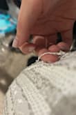 I love the look of this dress. Fits me perfectly.  And I know I'll get compliments on it. However, I will say the beading on the dress is super sensitive. So be very careful when putting it on. Part of it came off when I opened the dress out of the packaging. - Sara S.