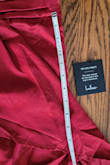 I ordered this dress, used the sizing chart then read all the reviews to figure out what size I would be. The sizing chart was telling me I would be more than an XL, but after reading reviews and looking at what people ordered, I went with a medium since I am usually a small or a medium. I am 5' 6 and 150. I was about 6 inches from being able to zip it up. So humbling. There is no stretch at all. Also, that slit is exactly what people said in some reviews. It's literally showing off your bikini line; it's not near your thumb like in the photo on their site. I measured from side to side, at the smallest part of your dress that doesn't sit on your waist but rather your ribs; it's 14 inches. Then from the top of the dress to that part of your waist you have 6" of material (this is where your bust needs to fit and then your "waist" starts there. Then from that part of your waist to the bottom of the slit you have 12"!!! So measure from under your bust, 12" and you have a slit. I can only post 2 photos so I did below. - Erica I.