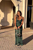 I actually bought this dress in a medium and returned to size down to a small. I wore this dress for a wedding and I absolutely loved it. I had enough support without wearing a bra. The train is a little long & for reference I am 5'6 and was wearing 3" heels - because of that I stepped on the dress a few times and it accidentally pulled and tore the mesh however it wasn't noticeable. Definitely would repurchase other dresses from lulus. - Shabana R.