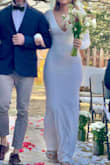 Beautiful gown and very good quality. Many reviews said it runs big so ordered one small and one x-small. Both fit, but the small fit better. The x-small kept falling off the shoulder; the small stayed well. Used clothes tape to make sure. - Val P.