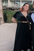 The dress was lovely and fit perfectly. A little long but I wore 2 inch heels and that kept it floor length without dragging. The material was sturdy but the weight made the dress feel lavish. I accented it with a gold belt and pearls. - Anycia V.